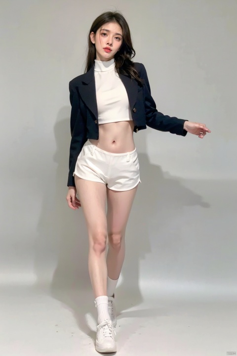 A girl, full body photo, long legs, indoor, (Pure gray background: 1.1),.Keywords studio, sunlight, realism, artistic atmosphere, artistic photo,full body,long legs,White suspender, black laser suit jacket, micro-curly long hair, revealing belly, revealing navel, black high waist shorts, hip-wrapped shorts, white shoes.Gaze at the audience