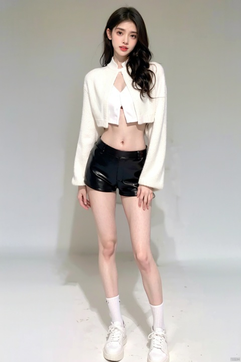 A girl, full body photo, long legs, indoor, (Pure gray background: 1.1),.Keywords studio, sunlight, realism, artistic atmosphere, artistic photo,full body,long legs,White suspender, black laser suit jacket, micro-curly long hair, revealing belly, revealing navel, black high waist shorts, hip-wrapped shorts, white shoes.Gaze at the audience