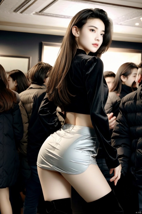HDR photo of woman at a busy night club, from behind, looking at viewer, partier, long sleeve crop top, miniskirt, alluring, long brunette hair, knee high boots . High dynamic range, vivid, rich details, clear shadows and highlights, realistic, intense, enhanced contrast, highly detailed
