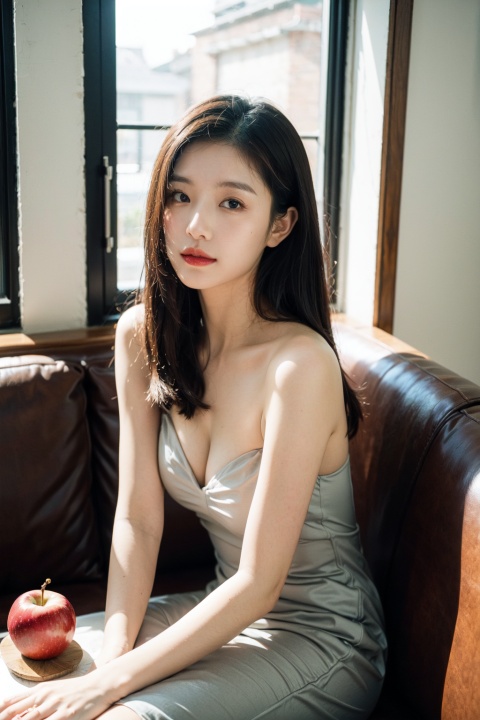  The image shows a beautiful young Asian woman in a grey dress sitting on a couch with a confident expression. The room has a soft and warm light, creating a comfortable atmosphere. The colors are muted and focused on the woman and her surroundings. The quality of the image is high, with sharp details and smooth textures. The woman's dress is one-shouldered and low-cut, showcasing her décolletage. There is a small table in front of her with apples on it. The overall style of the image is natural and organic, highlighting the woman's beauty and confidence.