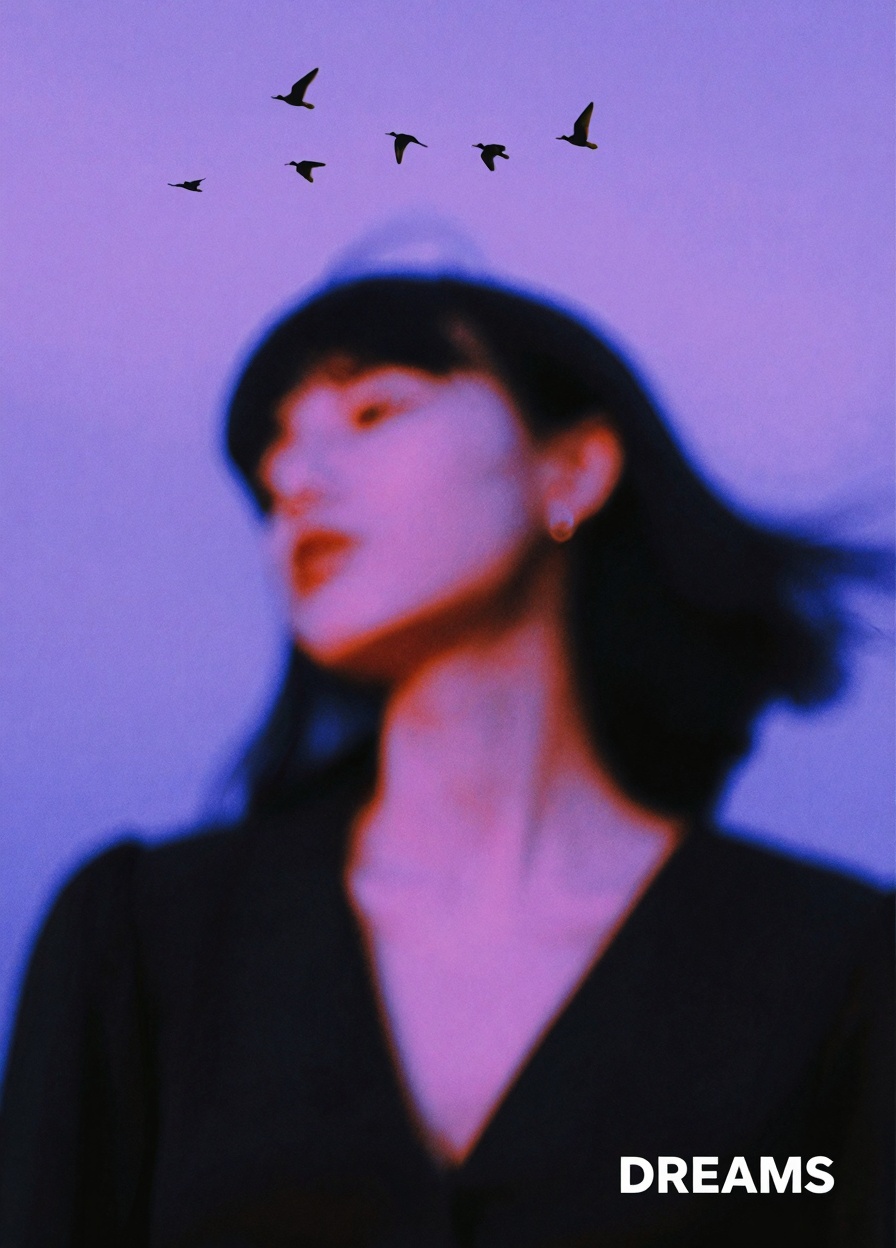 This is a photograph with a dreamy,  slightly blurred effect,  featuring a close-up of a person's head and upper shoulders...