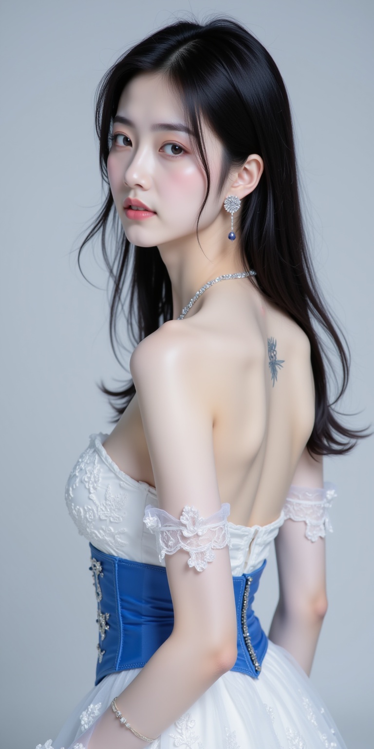 A photograph of a slender,fair-skinned Asian woman with long,straight black hair. She wears a strapless,white gown with a blue corset and sheer,floral-patterned overlay. Her back is partially exposed,revealing a delicate tattoo. She accessorizes with a choker and earrings. The background is a plain,light gray.,<lora:flux-lora_极品1-3:1>,