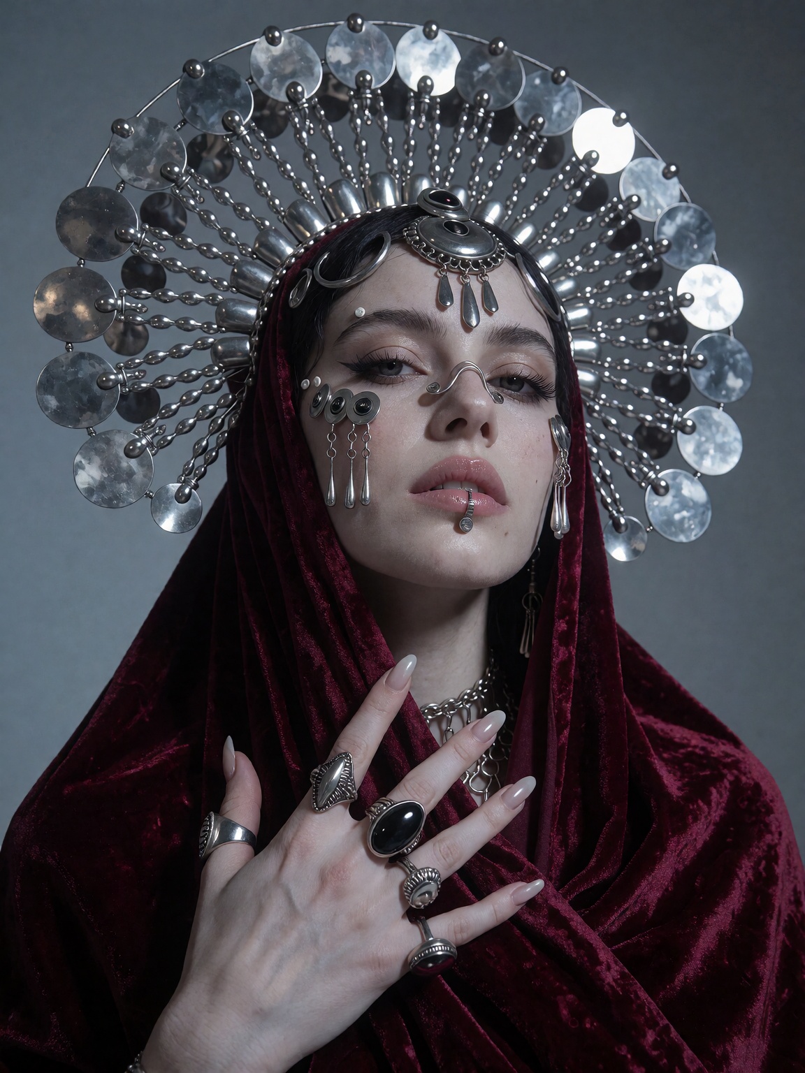 avant-garde fashion portrait of a pale figure,  massive silver disc headpiece,  crimson velvet wrap on Tensor.Art