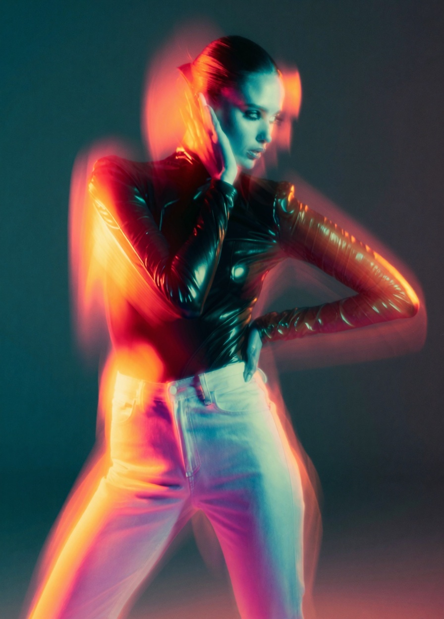 This photograph captures a dynamic and ethereal portrait of a young beautiful model woman in motion,  blending elements of...