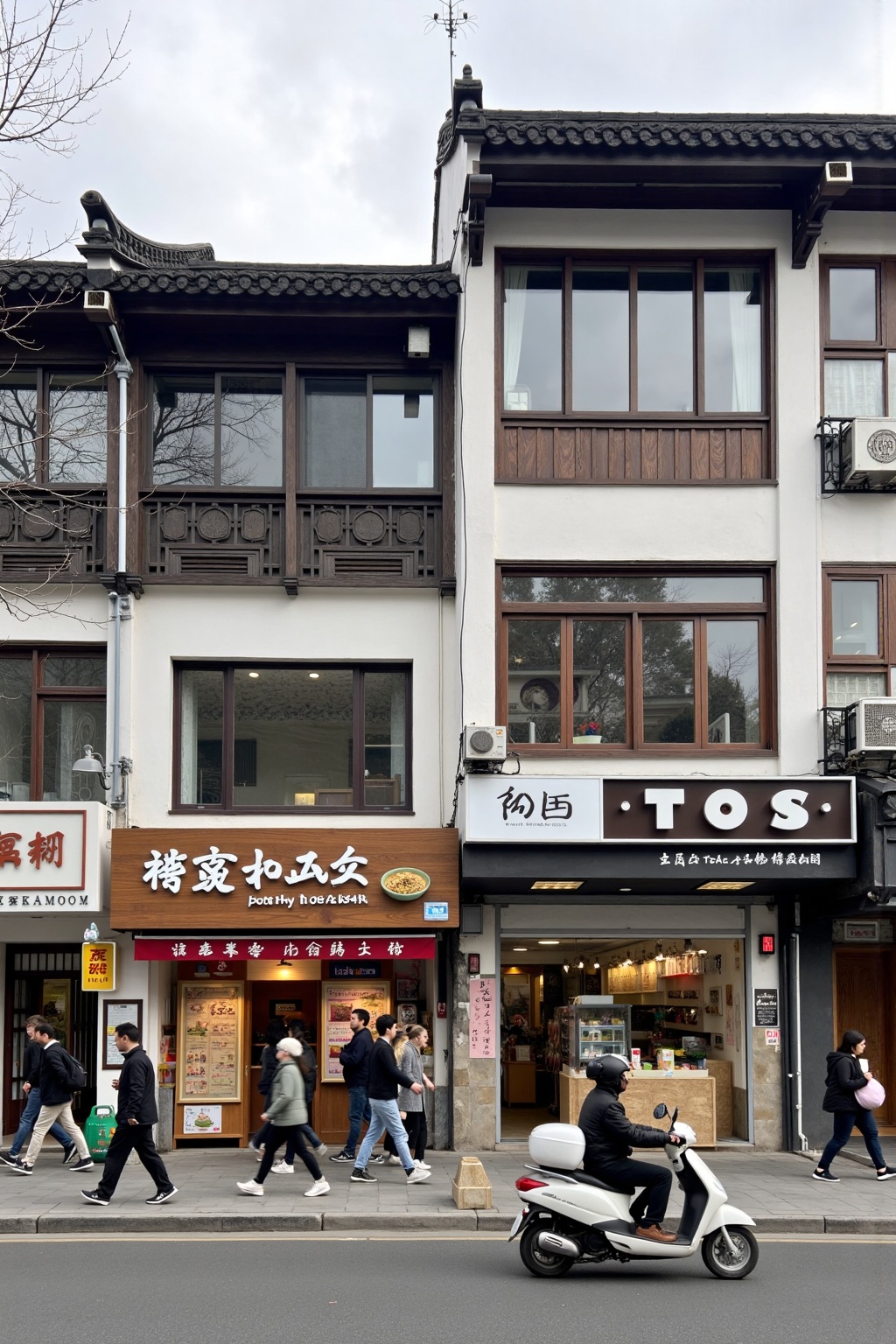 landscapejam, zssyj,landscapejam,zssyj,The image depicts a street scene with a row of shops and a few pedestrians. On the left,there is a shop with a sign that reads "Big Bowl Tea" and "Tea Art" in Chinese characters,along with a menu featuring various teas. Next to it,there is a shop with a sign that reads "Little Noodles" and "Pulling Noodles" in Chinese characters,along with a menu showcasing different types of noodles. On the right,there is a shop with a sign that reads "TOS" and "Tea and Travel" in Chinese characters,along with a menu featuring various teas and travel-related items. In front of the shops,there are several people walking,and a person is riding a scooter. The architecture of the buildings has a traditional style with wooden details and large windows. The overall atmosphere suggests a bustling urban area with a focus on Asian cuisine and tea culture.,landscapejam,zssyj,