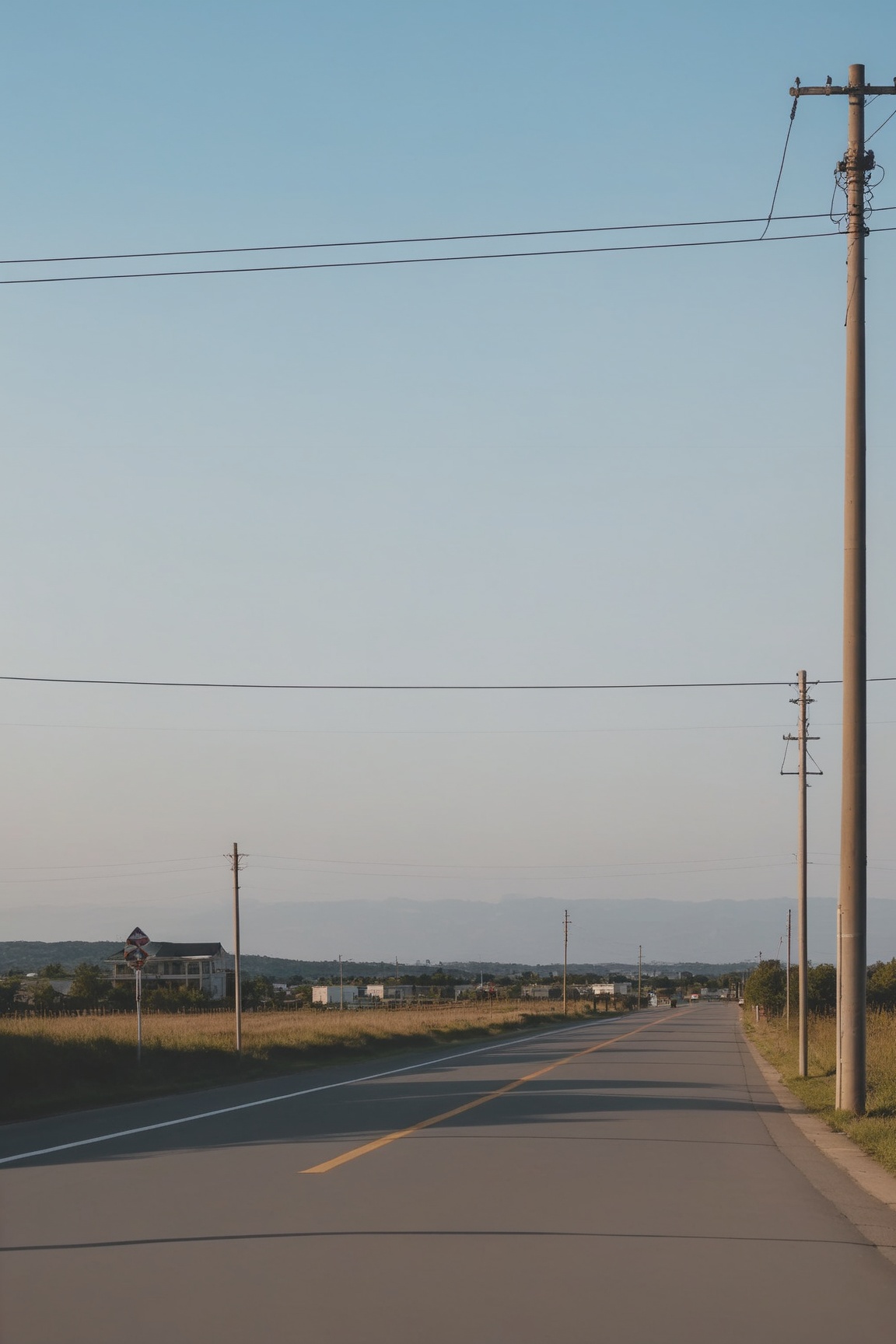 <lora:Anchestreet-V1:0.7>,anchestreet,no humans,outdoors,scenery,road,power lines,sky,sign,utility pole,road sign,day,