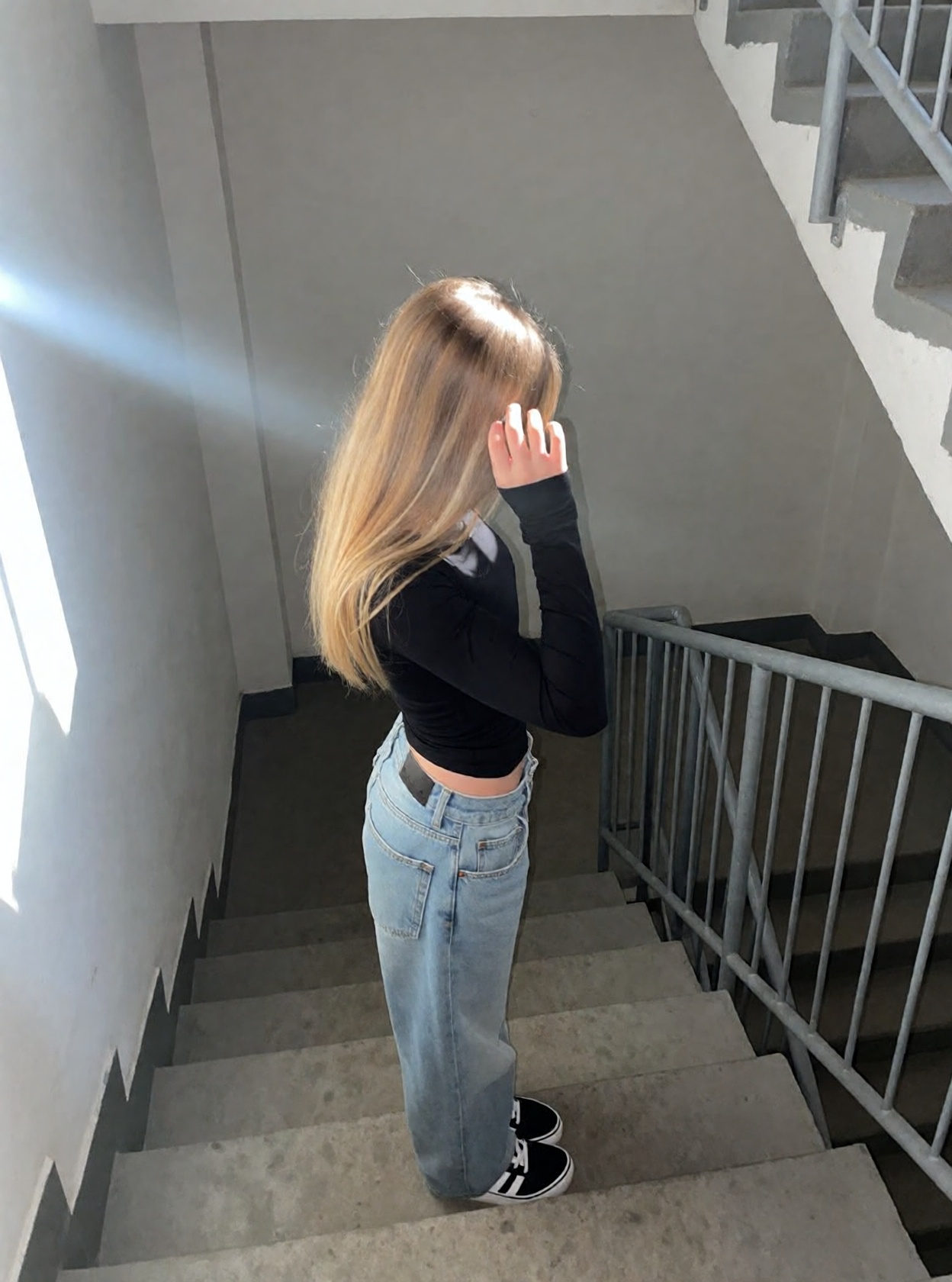 r3alism,  A person with long,  blonde hair stands on a concrete staircase on Tensor.Art