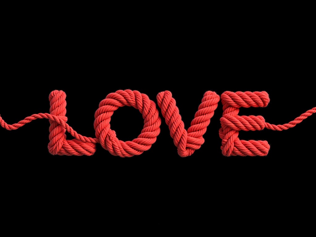 IPBD,This is a digital CGI image featuring the word "LOVE" crafted from intricately intertwined red yarn against a solid black background. The yarn forms a textured, rope-**** pattern, creating a visually striking contrast with the dark backdrop. The word is stylized, with each letter overlapping and twisting, giving it a three-dimensional, tactile appearance. 