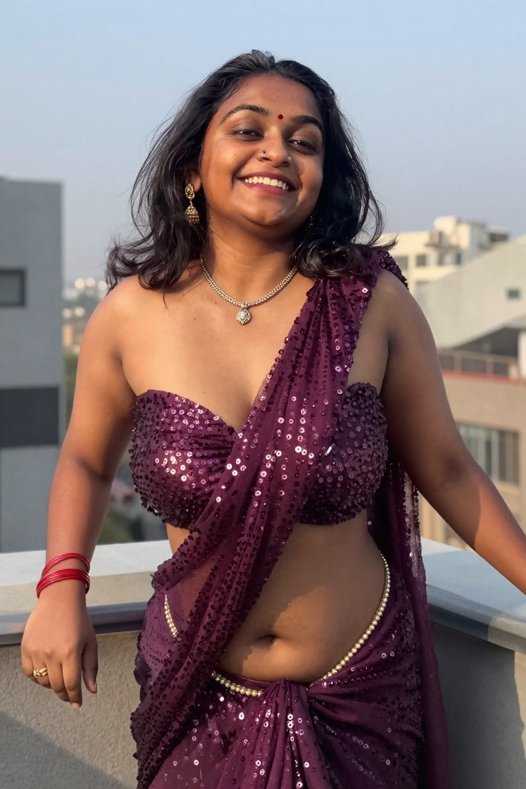 Photograph of a smiling Indian woman with medium-dark skin and black shoulder-length hair,  dramatic worm's eye shot from...
