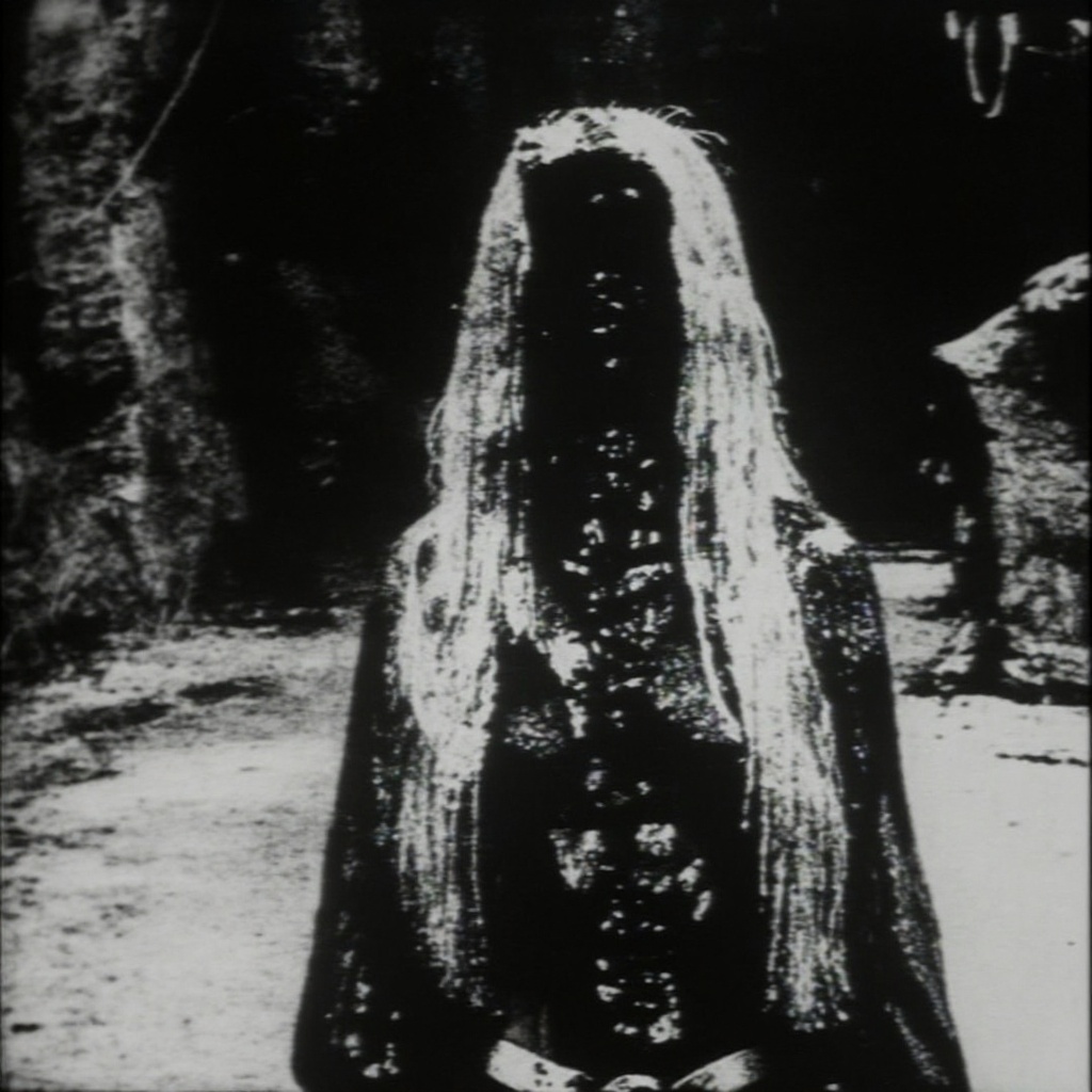 woman standing on a dark roadside at night,  her long pale hair hanging straight; where her face should be is a smooth bla...