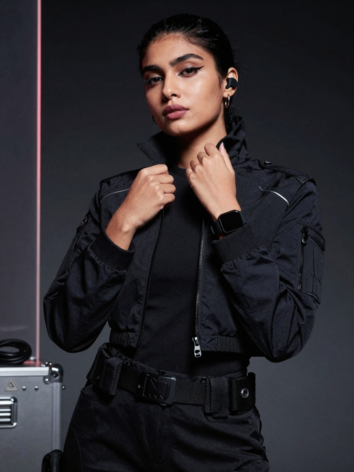 Close-up high-fashion editorial photoshoot portrait of a stunning south Asian woman in a cyberpunk-minimal tactical aesthe...