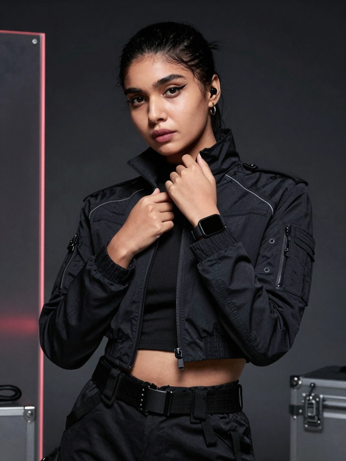 Close-up high-fashion editorial photoshoot portrait of a stunning south Asian woman in a cyberpunk-minimal tactical aesthe...