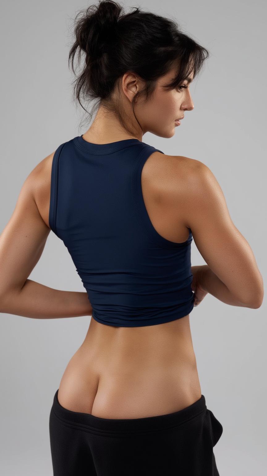 Hyper-realistic photograph of a fit young woman with dark messy hair in a high bun and sharp facial features,  captured fr...