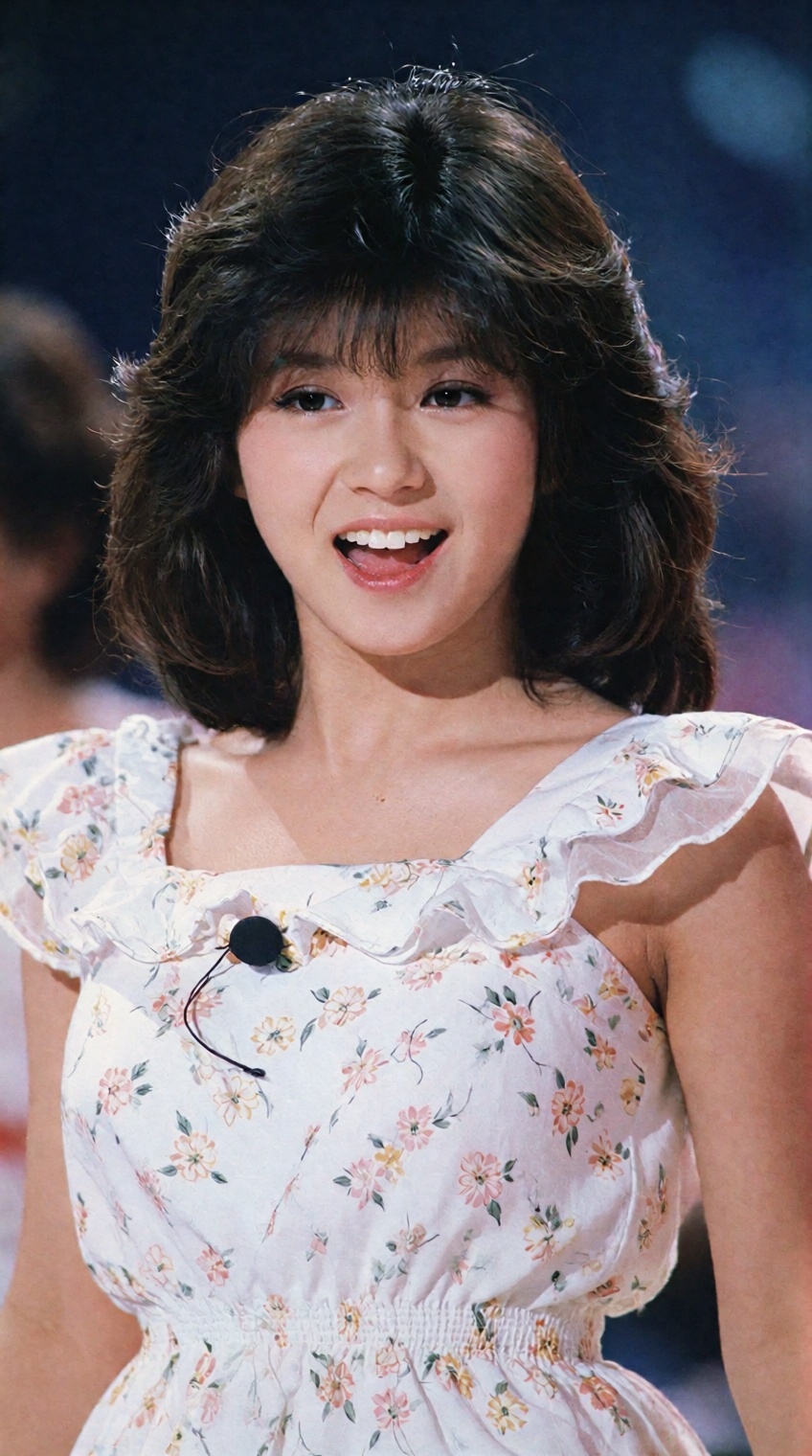 A classic 80s idol performance photograph,  capturing a young woman with a feathered bob hairstyle on stage. She is wearin...