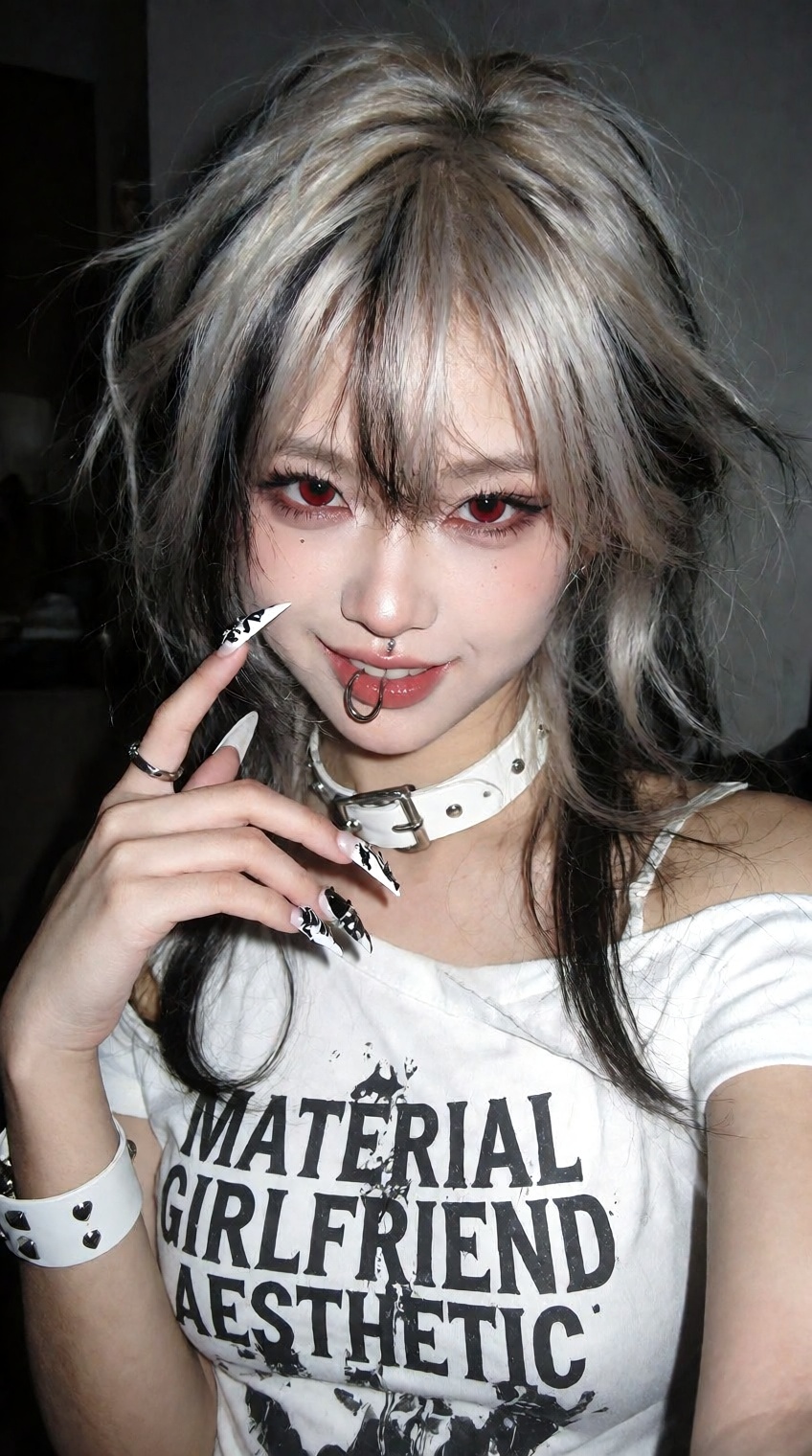 high-angle selfie shot of an edgy Asian girl with a gothic vampire aesthetic. She has messy platinum blonde hair with dist...