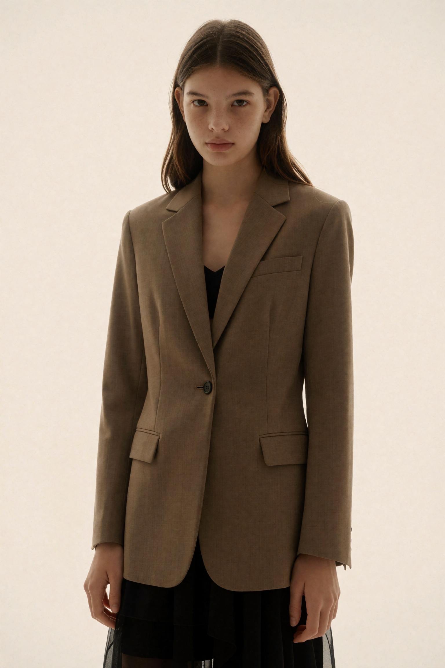 Visualize a subtle image of a flat-chested,  lissomely slender girl,  elegantly clothed in a beige blazer. Standing in the...