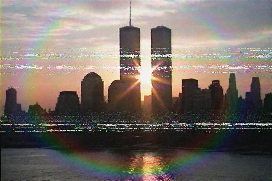 a sunset view of the New York City skyline including the Twin Towers is deeply corrupted by severe horizontal tracking err...