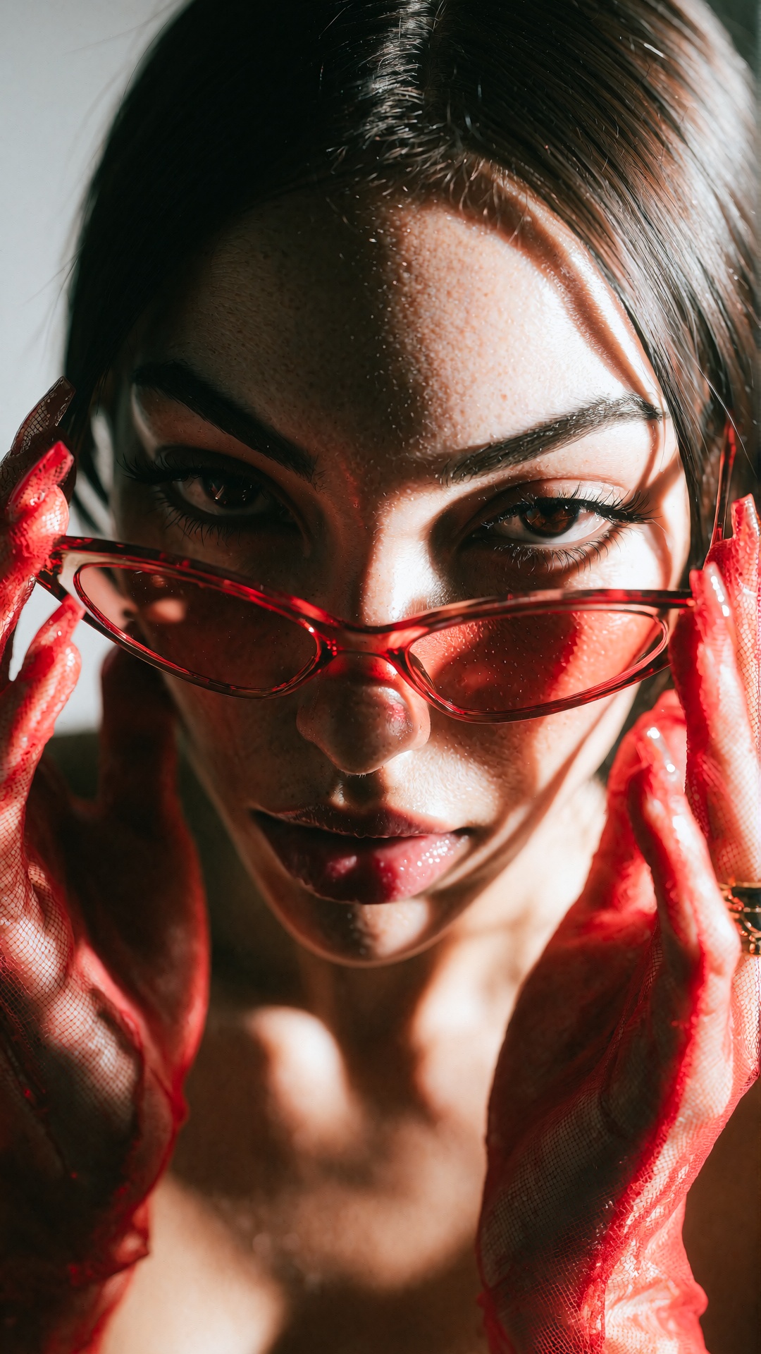 midjourneyanalog13z20 photograph. Extreme close-up of a young woman with a bold,  intense expression. She has dark hair pu...