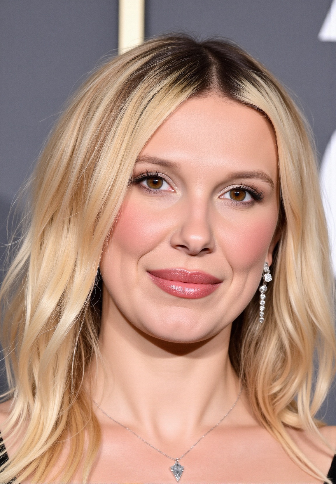 a close-up portrait of 21 year-old millie bobby brown looking at viewer (mature millie bobby brown,  millie bobby brown fa...