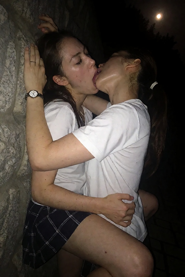 lkd,  old leaked photo of two lesbian japanese students against the wall kissing passionately under the moonlight on a hid...