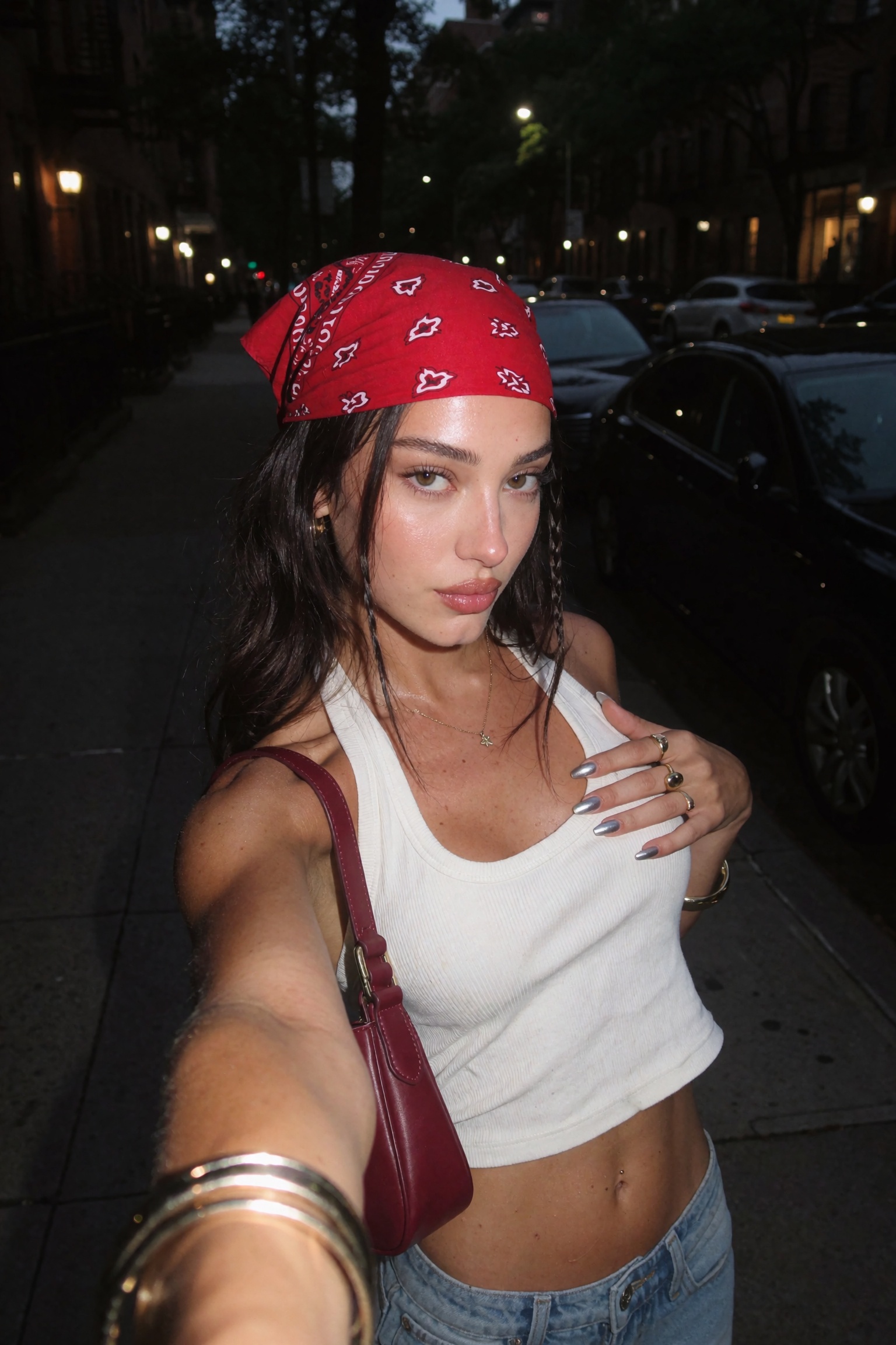 Candid UGC smartphone night selfie of an ***** woman with a refined oval face,  softly defined jawline,  delicate chin on...