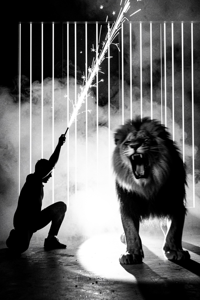 black and white high contrast photography,  silhouetted figure on the left crouching and holding a long wand emitting brig...