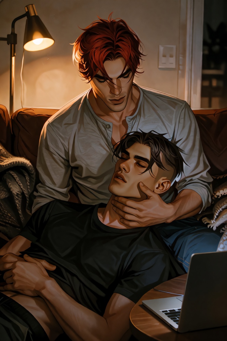 Close-up of two men on a couch,  one lying back with his head on the other's lap. The man sitting up has thick auburn hair...