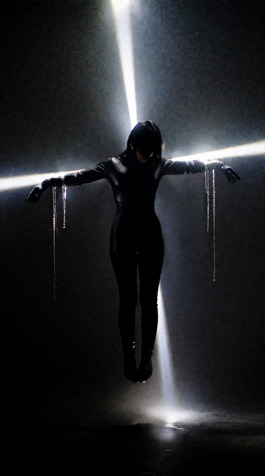 @oswaldo_cepeda,  a lone silhouetted figure hovers in darkness,  arms stretched wide in a cruciform pose on Tensor.Art