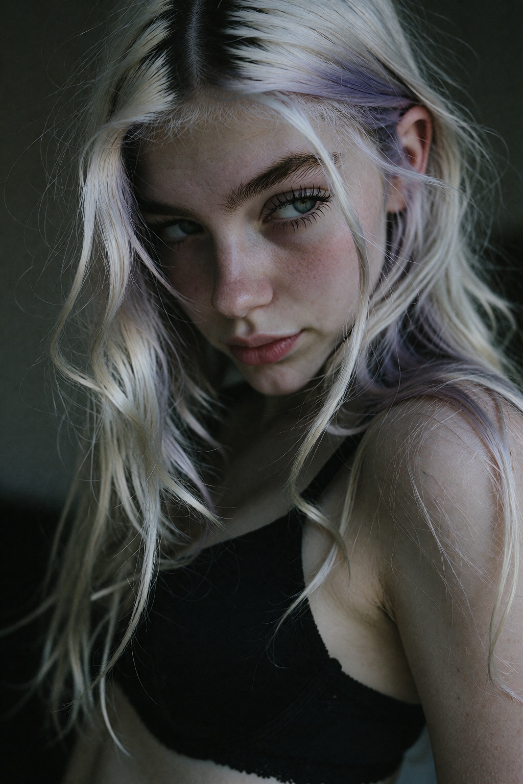 K_IvySReal. Candid portrait of a 20-year-old young girl. She has pale skin with long platinum hair,  visible natural dark...