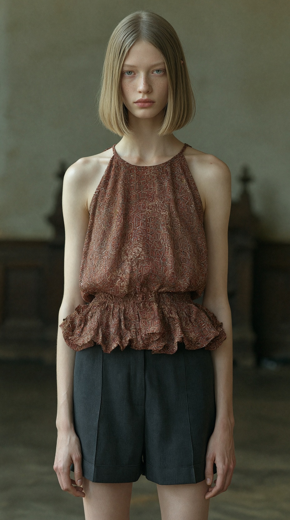Give the woman in a clean chin-length bob haircut. Keep everything else unchanged: face,  body,  pose on Tensor.Art