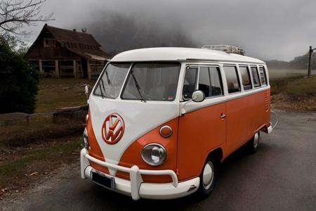 analog gloomy photo of an orange volkswagen kombi,  ,  ) on Tensor.Art