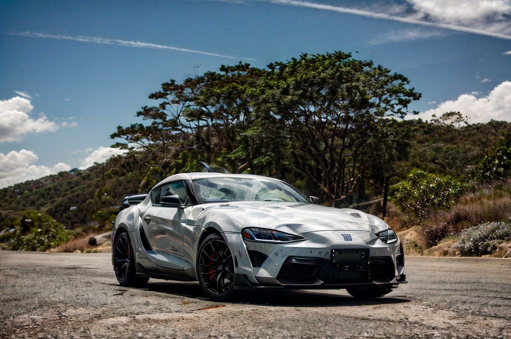 Supra A captivating image of a Supra,  its sleek silhouette painted in a mesmerizing pearlescent white. The photo showcase...
