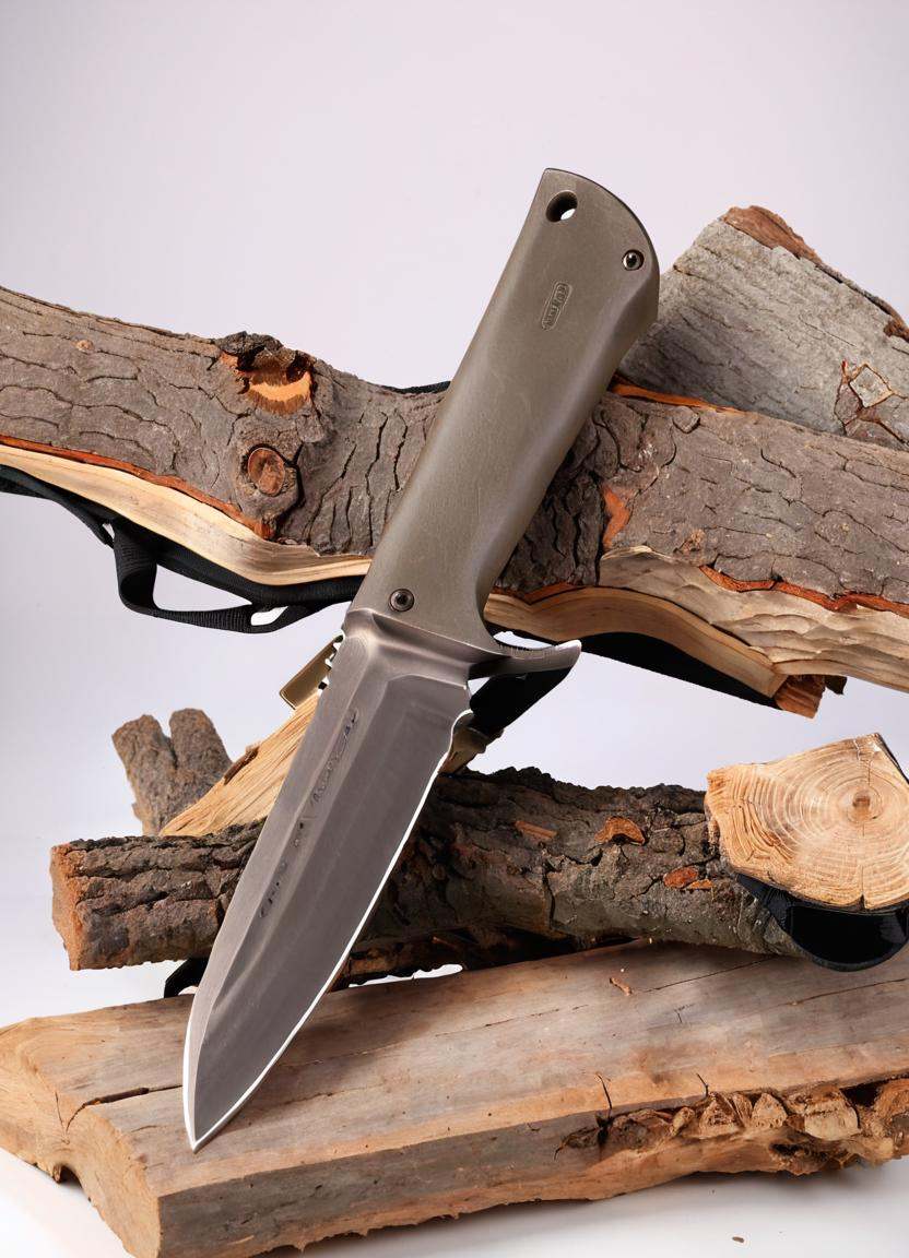 Real estate photography style a knife sitting on top of a piece of wood next to a piece of wood with a knife sticking out...