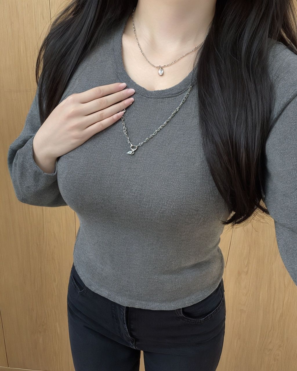 bodyshow, 1girl, solo, jewelry, necklace, long hair, head out of frame, black hair, denim, hand on own chest, shirt, breasts, jeans,<lora:bodyshow:0.6> 