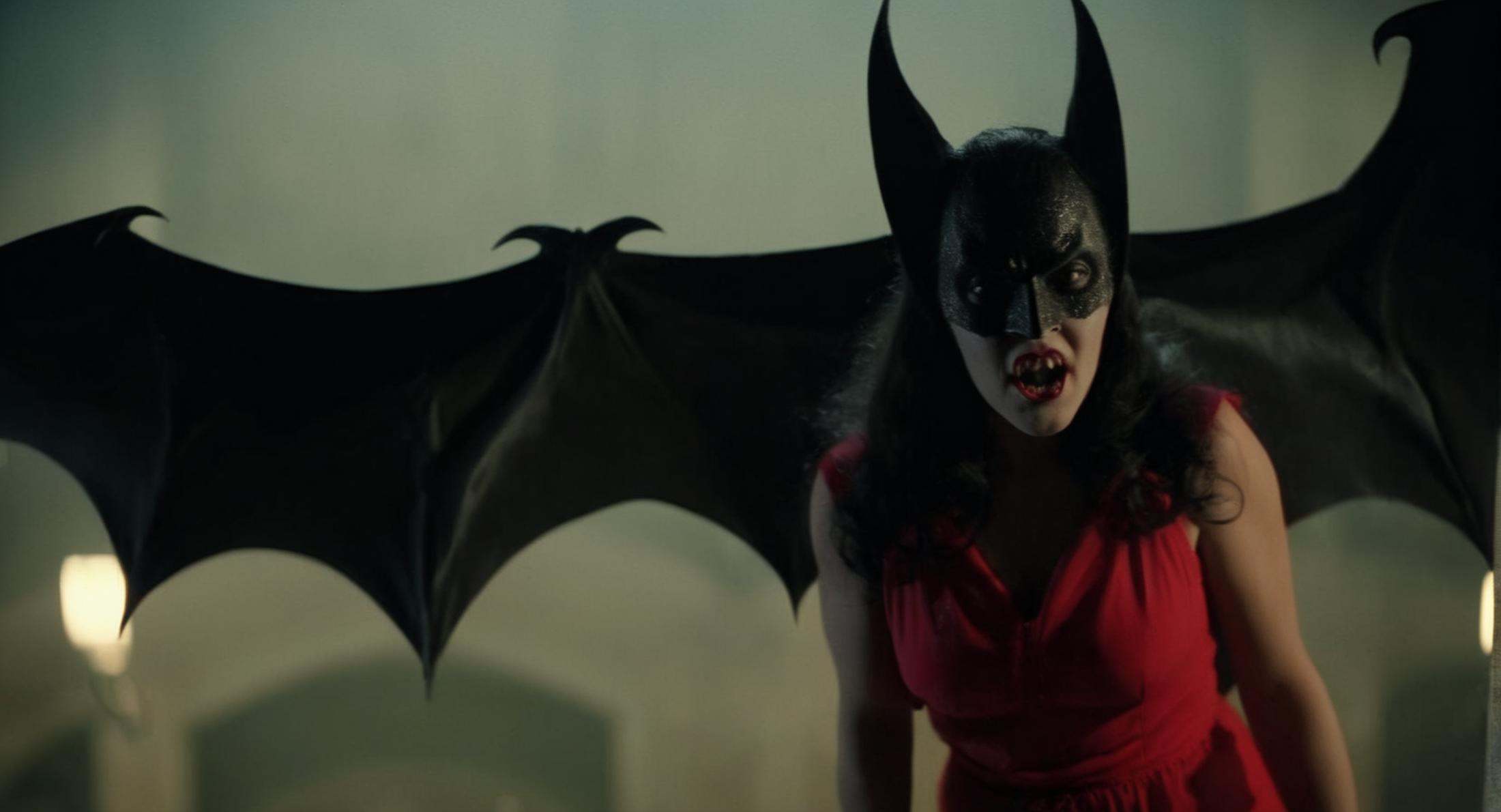 cinematic film still of Cinematic Film stock footage in (arri alexa style) Kodak film print,  Batman Vampire a woman in a...