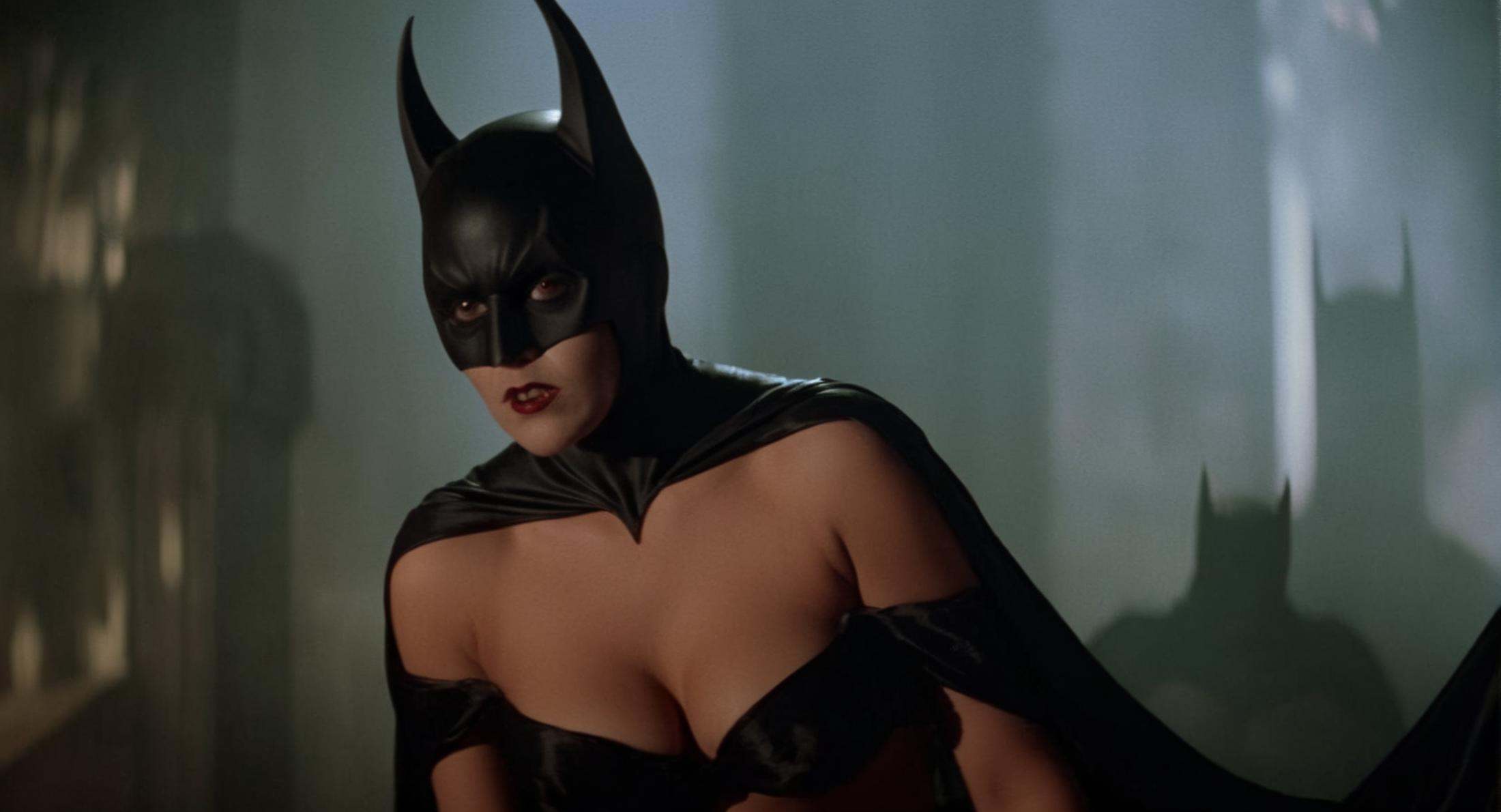 cinematic film still of Cinematic Film stock footage in (arri alexa style) Kodak film print,  female Batman Vampire a nake...