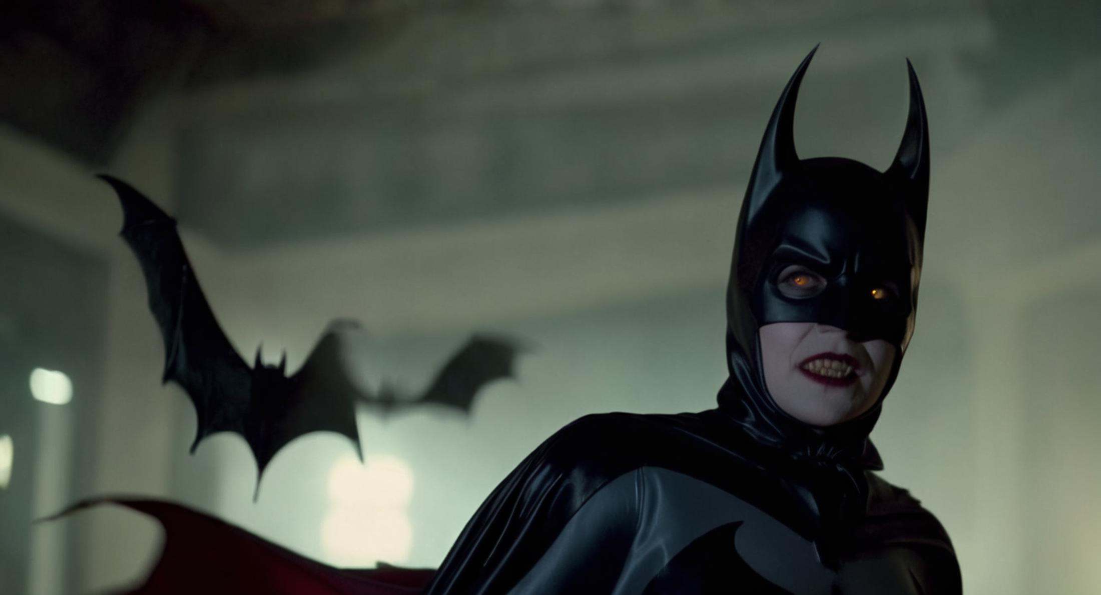cinematic film still of Cinematic Film stock footage in (arri alexa style) Kodak film print,  female Batman Vampire a woma...