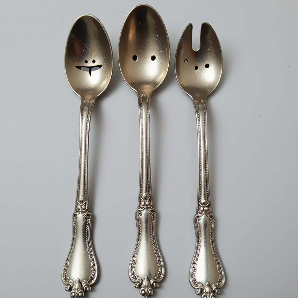 <lora:PareidoliaFlux:1>Pareidolia a Spoons that looks like a face