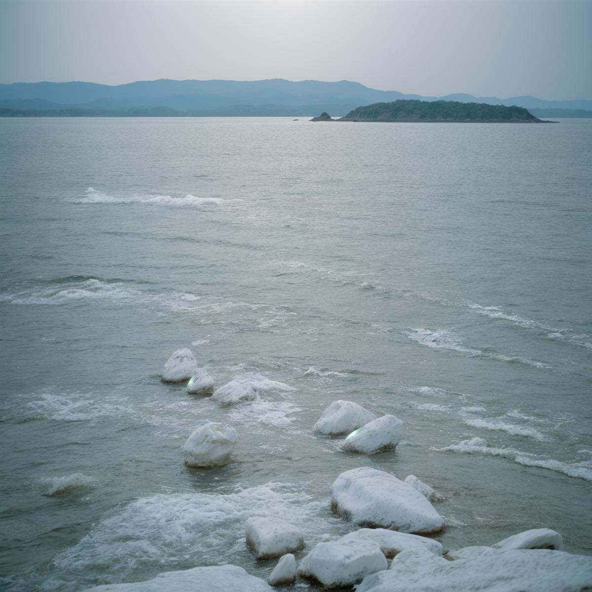 cinematic film still of a view of a body of water with a lot of white rocks,  outdoors,  day on Tensor.Art