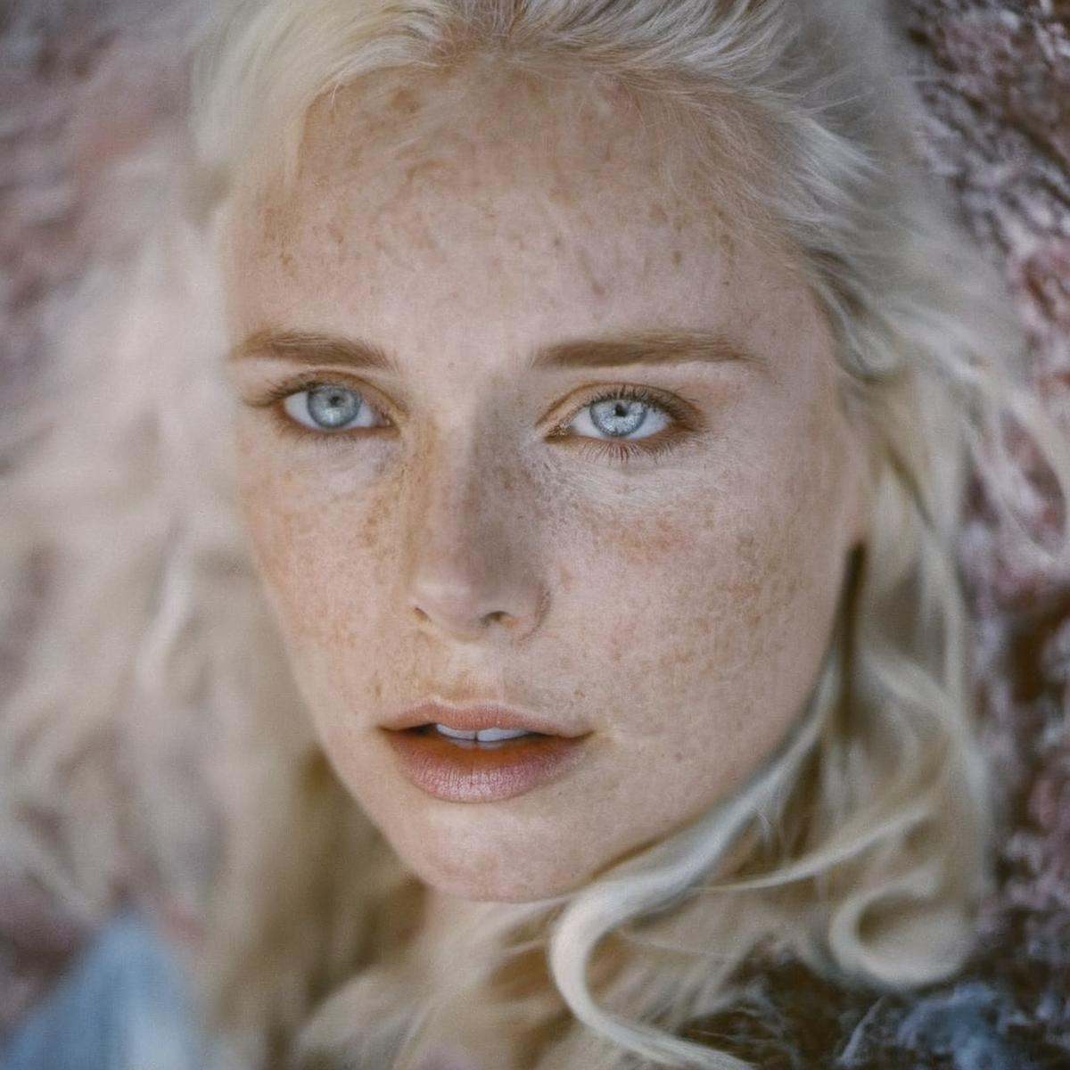 cinematic film still of very detailed skin poreA cinematic skin texture style still image of a woman with white hair and b...