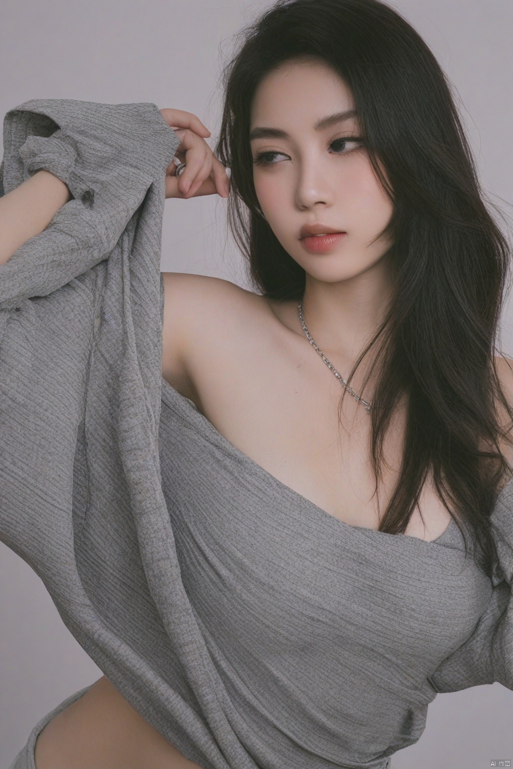 a medium-sized Asian woman with long,  straight black hair,  wearing a silver ring on her left hand and a silver band on h...