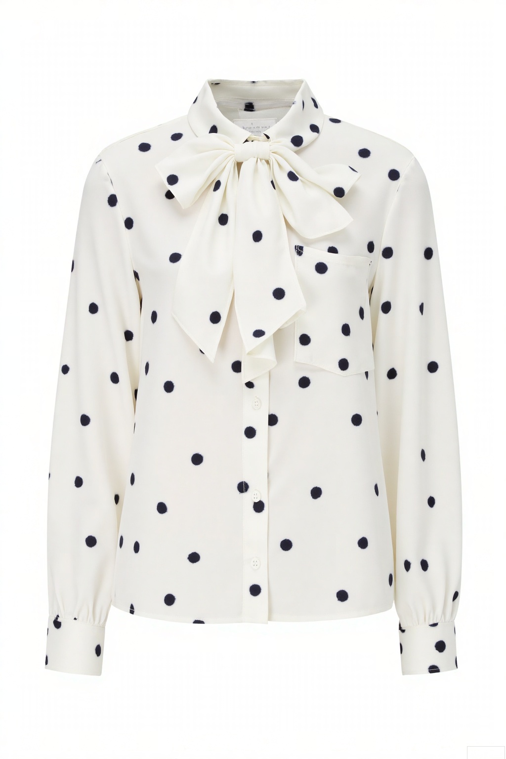Garment Style
 
- This is a long - sleeved blouse. It features a classic collar and a button - up front. The overall cut is tailored to fit the body moderately, offering a neat and refined silhouette. The fabric appears to be light and flowing, likely silk or a silk - like material.
 
Matching
 
- There are no additional accessories shown in the image. However, the blouse itself is a versatile piece that can be paired with various bottoms such as tailored trousers, pencil skirts, or A - line skirts for different looks.
 
Decoration
 
- The blouse is adorned with a pattern of evenly - spaced black polka dots on a white background, which gives it a playful yet sophisticated look. A prominent decorative element is the large bow at the neckline, tied in a neat knot, adding a feminine and stylish touch. There is also a single pocket on the left side of the chest, which is both functional and aesthetically pleasing.
 
Background
 
- The background should be plain white. A clean, minimalist background ensures that all attention is focused on the blouse, highlighting its details, pattern, and overall design without any distractions.