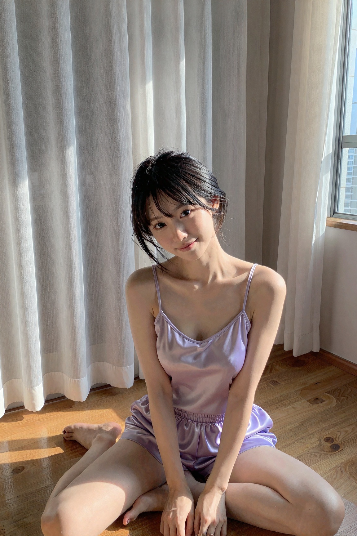 A young Japanese woman with porcelain skin and silky jet-black hair in a low messy bun,  sitting cross-legged on the floor...
