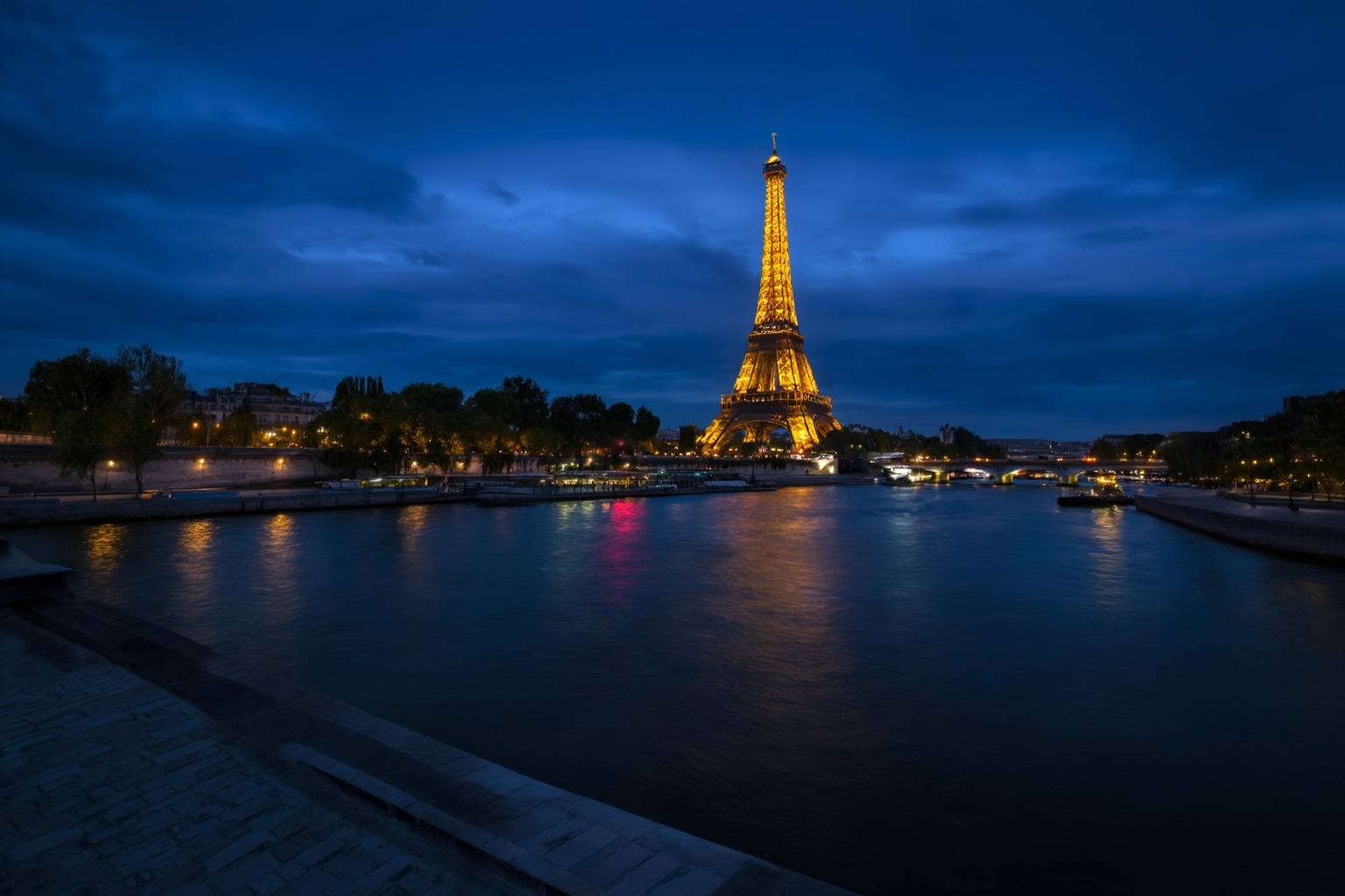 aurelmanea3z photography. Paris at night,  showing the Eiffel Tower and the Seine River on Tensor.Art