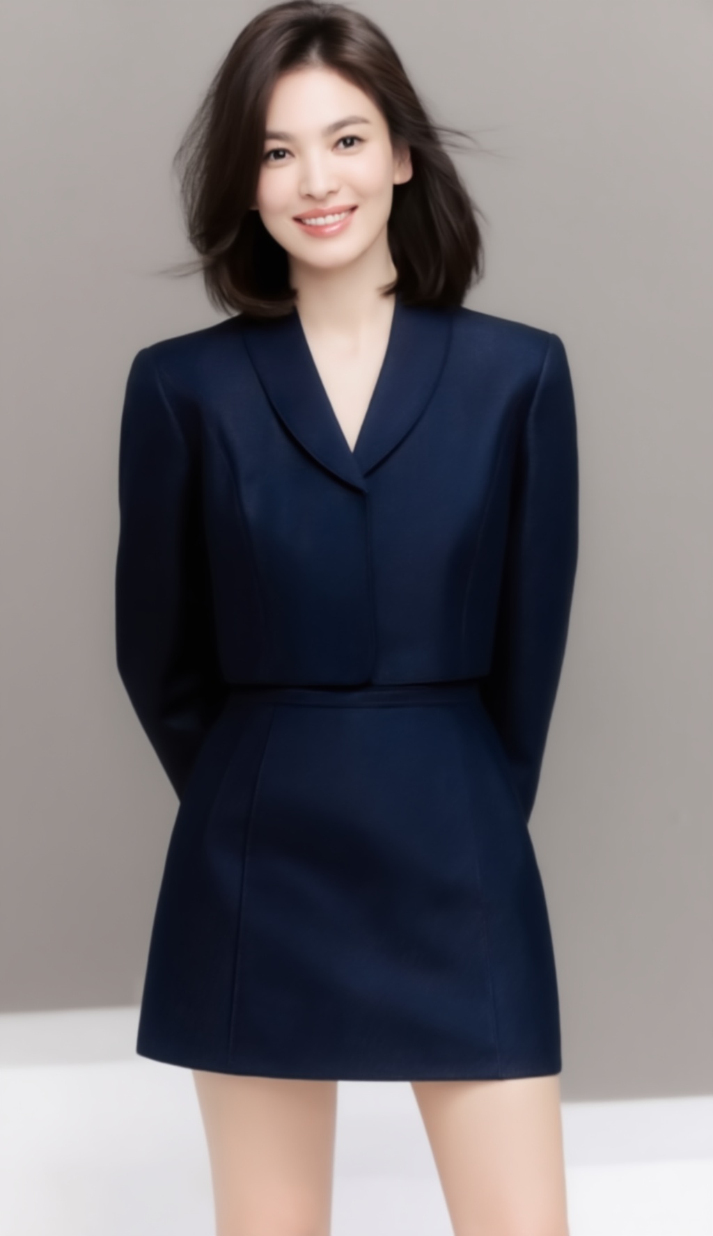 A high-end editorial fashion photograph of a beautiful 20-year-old woman with medium-length hair gently flowing in a soft...