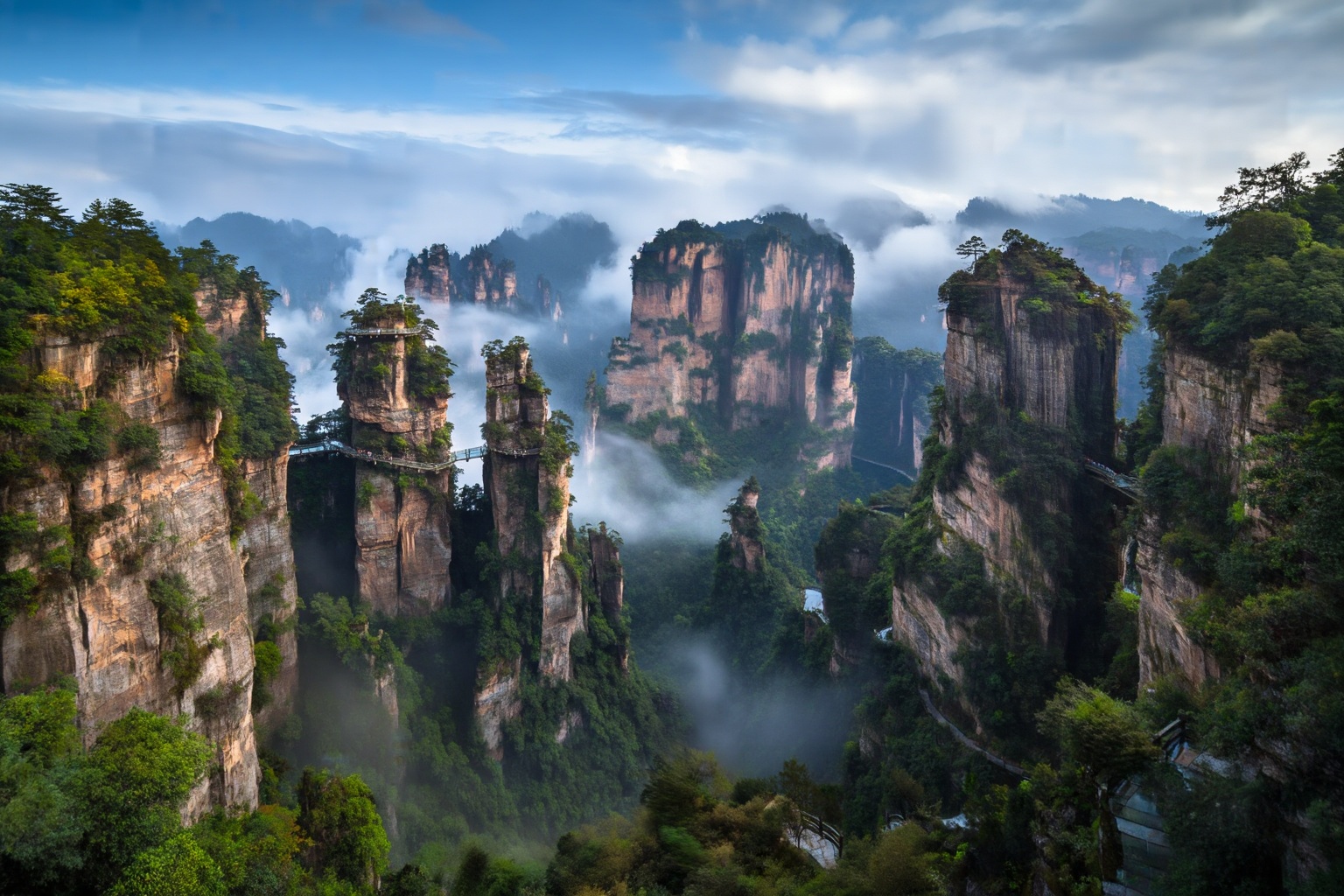 aurelmanea5z25 photography. A surreal and awe-inspiring landscape shot capturing the unique,  pillar-like sandstone peaks...
