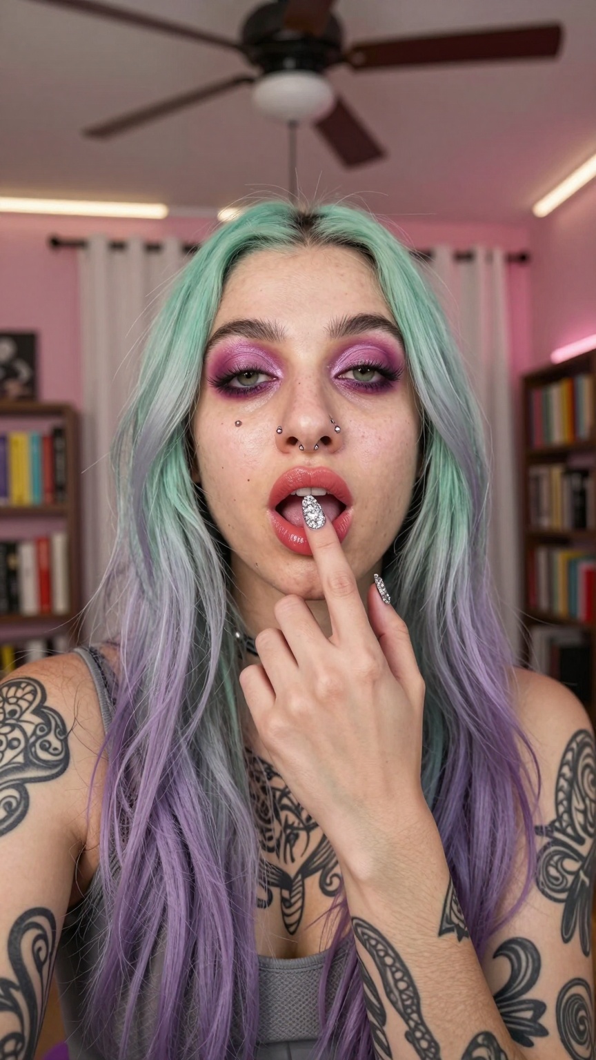 TouchingLip.A close-up selfie captures a person with long,  straight hair transitioning from mint green at the roots to la...
