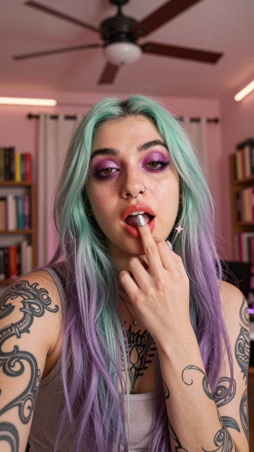 TouchingLip.A close-up selfie captures a person with long,  straight hair transitioning from mint green at the roots to la...