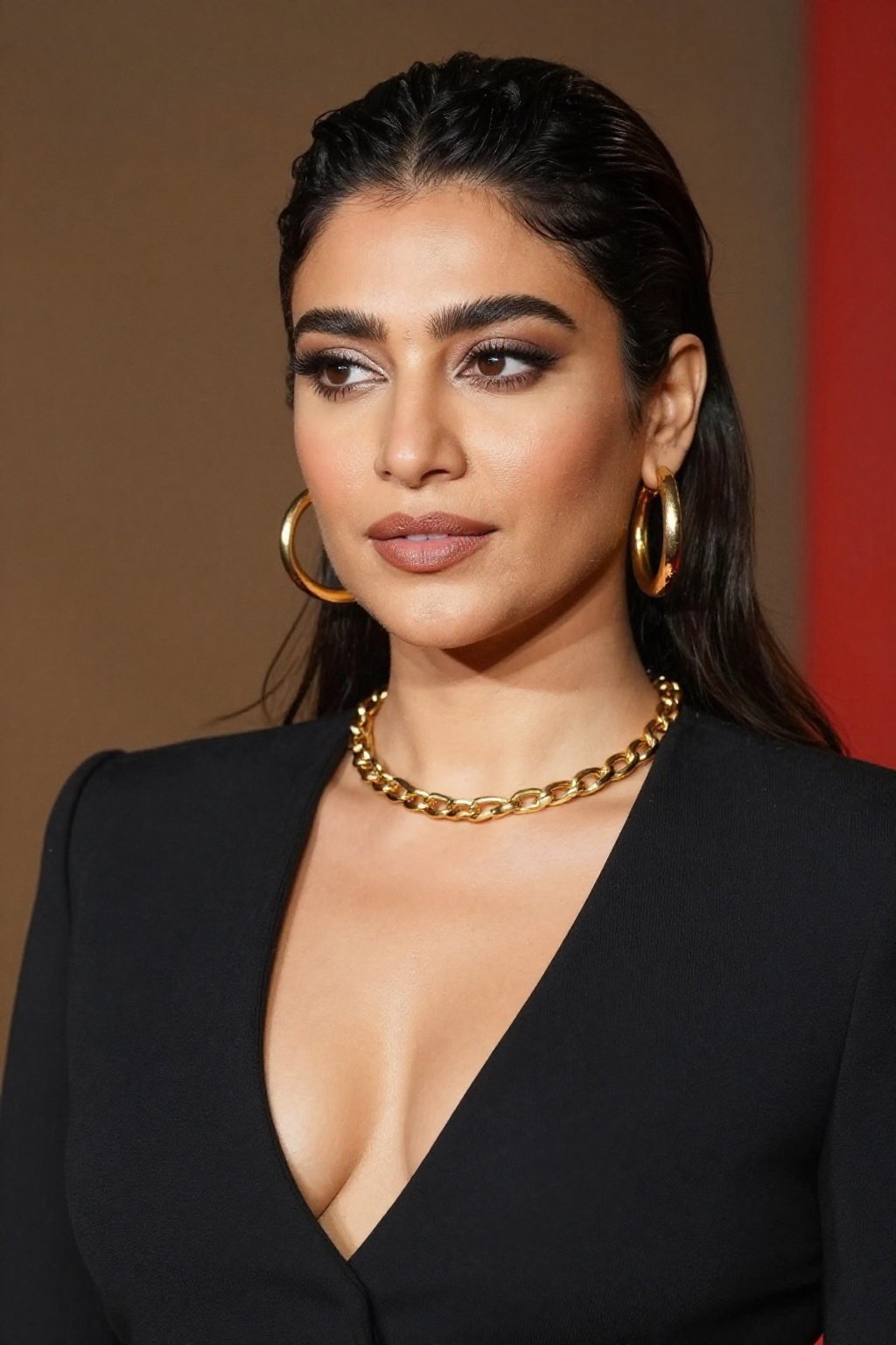 Photograph of a woman with light olive skin and dark,  slicked-back hair,  wearing a black on Tensor.Art