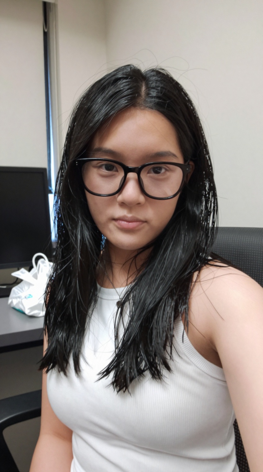 taken_by_ph0ne,  A young woman with long,  straight black hair and dark-rimmed glasses gazes directly at the viewer on Ten...